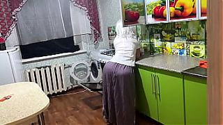 Stepmom is standing in the kitchen and wants anal sex for her mature and big ass